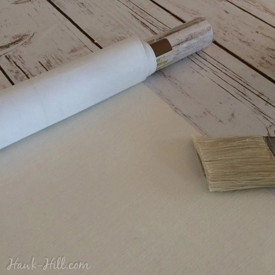 Blog tutorial on how to use cheap photo backdrop paper to create easy, seamless faux rustic barn wood. - Hawk-Hill.com