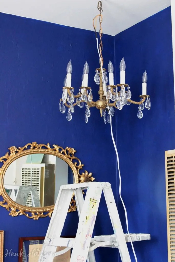 hanging a chandelier in a rental apartment