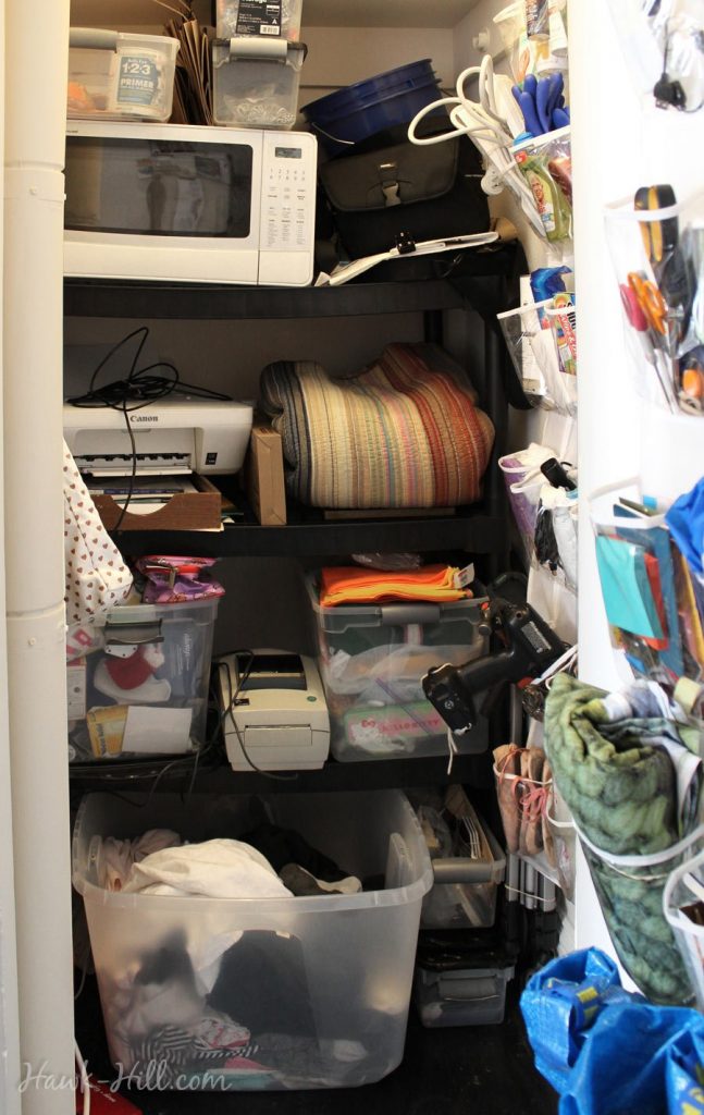 Deliberately placing my ugliest stuff on a shelf in my only closet meant I could have my living space free from eyesores