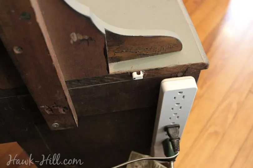Place a power strip behind your nightstand