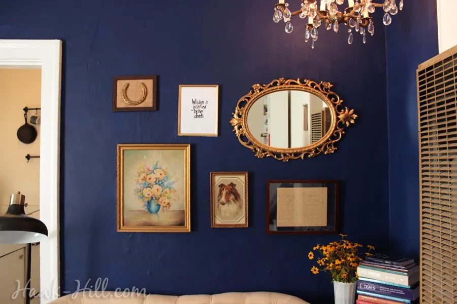 gallery wall with framed horse shoe