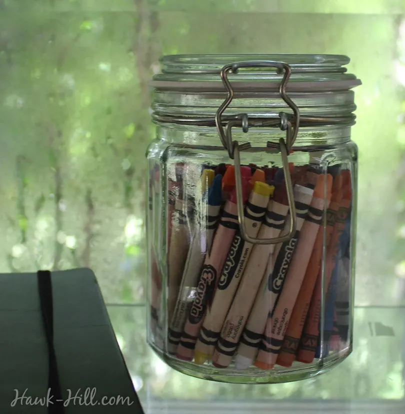  decanting my art supplies into jars and hurricane glass keeps them visible and organized