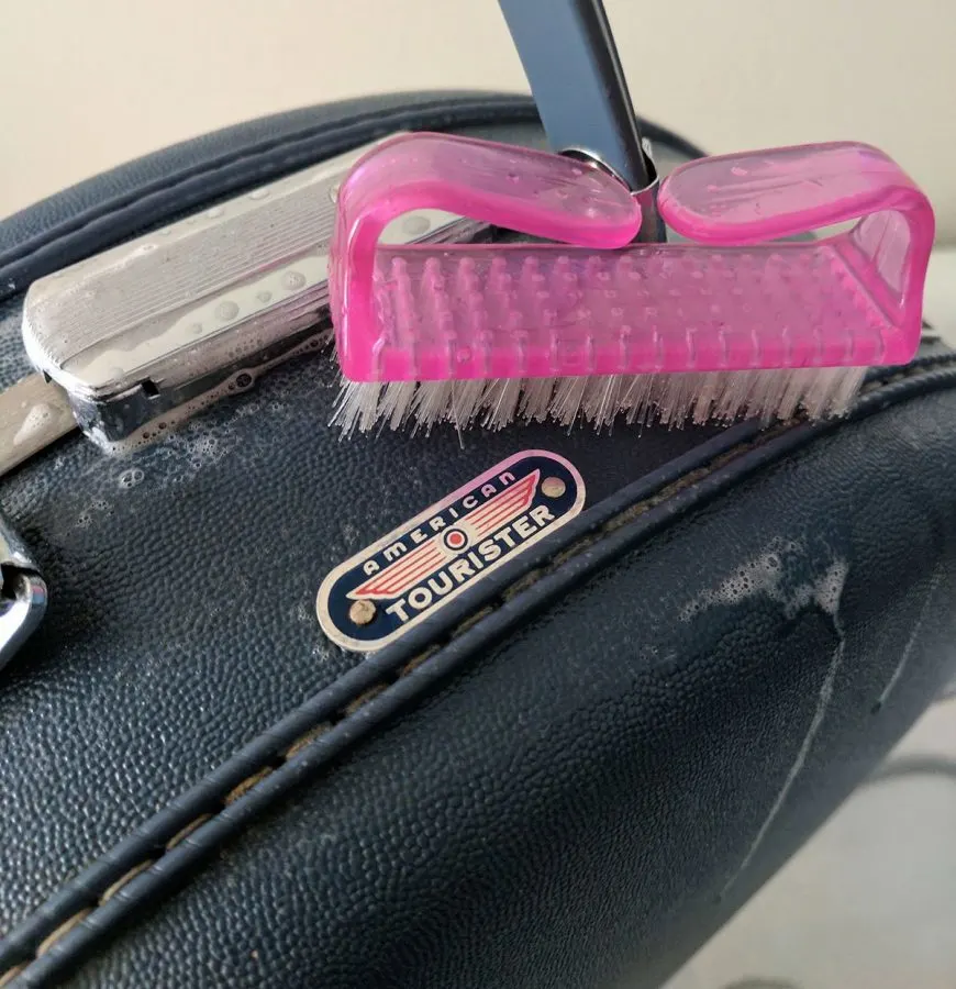 cleaning an american tourister vintage hat case