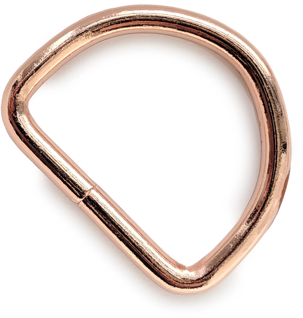 A rose gold d ring with welded connection.