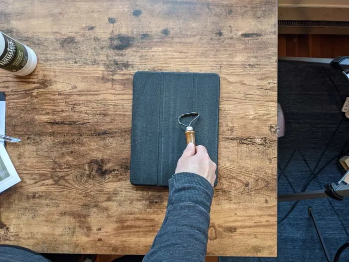 To start, rough up the surface of your iPad case so that your new pattern can adhere