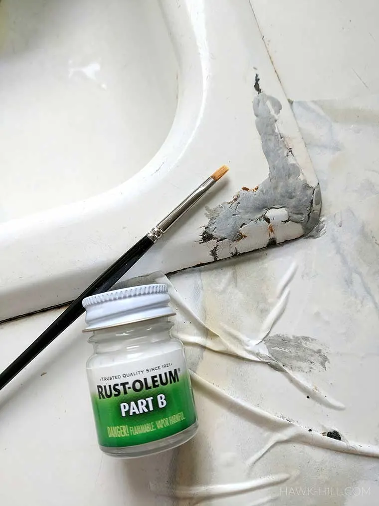 Use only special enamel paint for covering the patch- it's water resistant and has the sheen of a cast iron tub finish