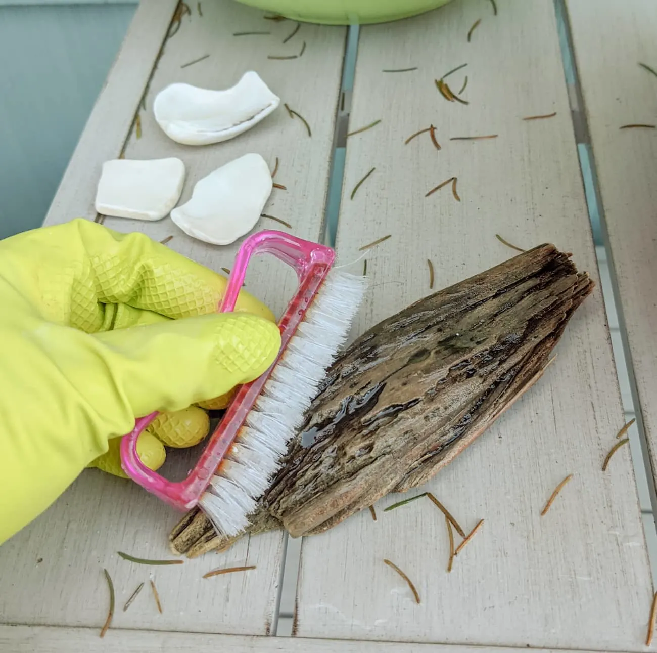 Scrubbing can remove debris that is embedded in the wood