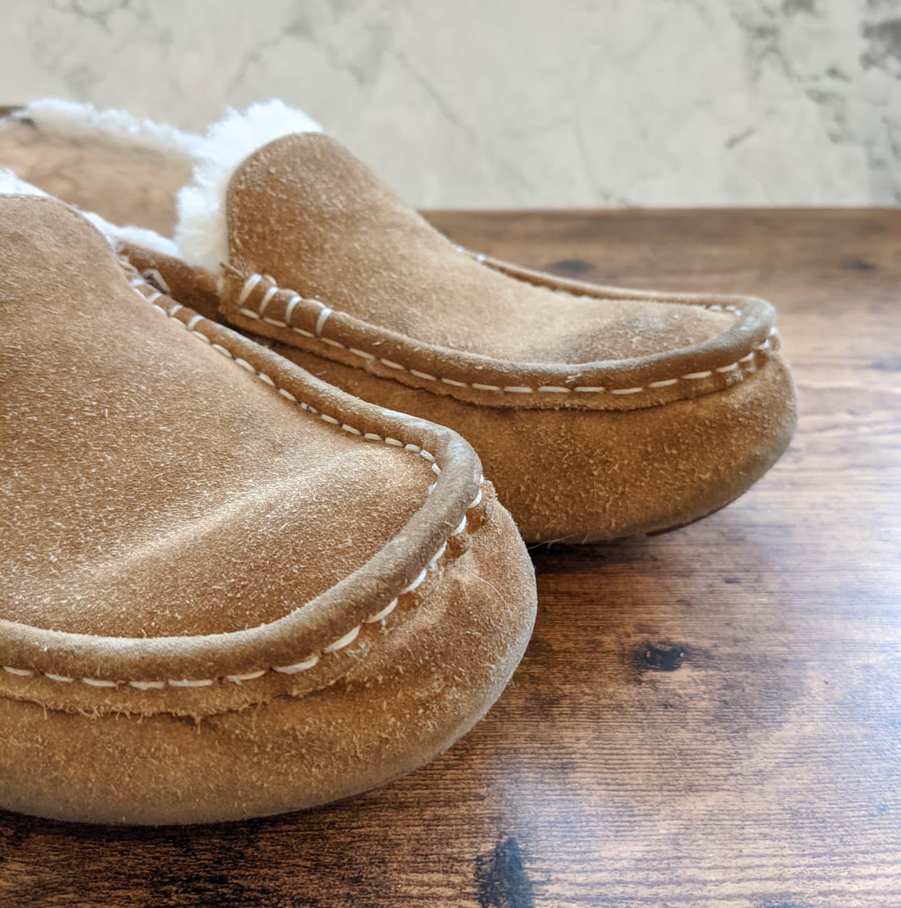 One step in cleaning sheepskin and suede slippers