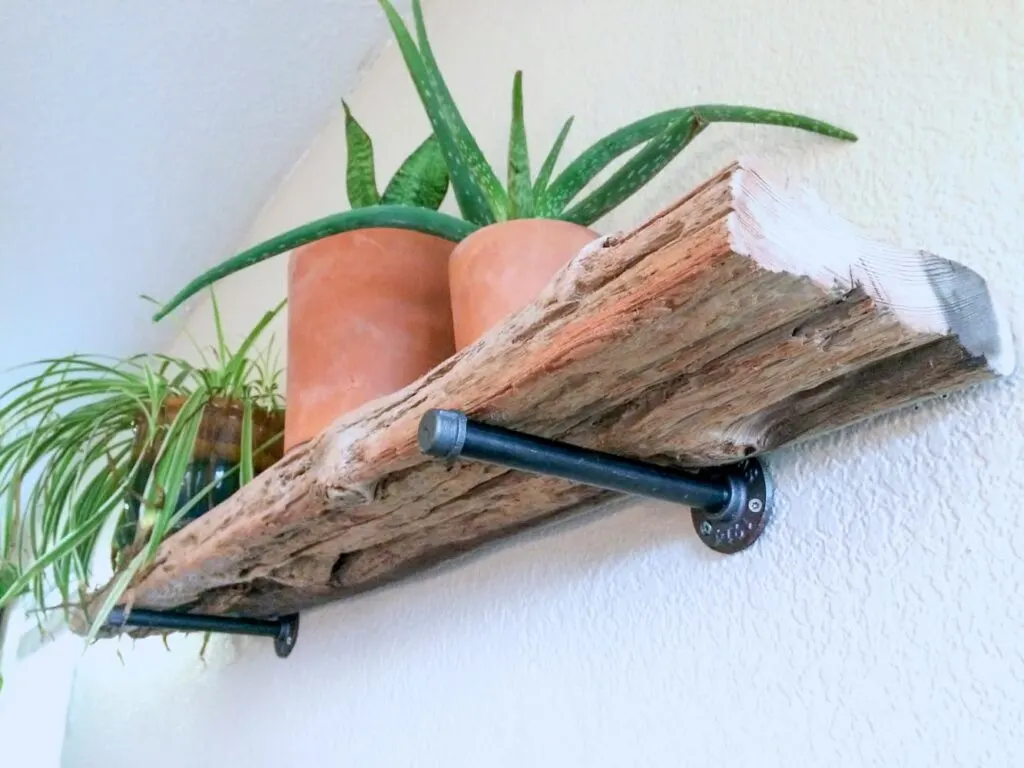 Live edge driftwood shelves made using basic hardware