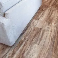 An image of Brentwood pine pergo laminate flooring in a home.
