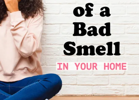woman smelling a bad odor.