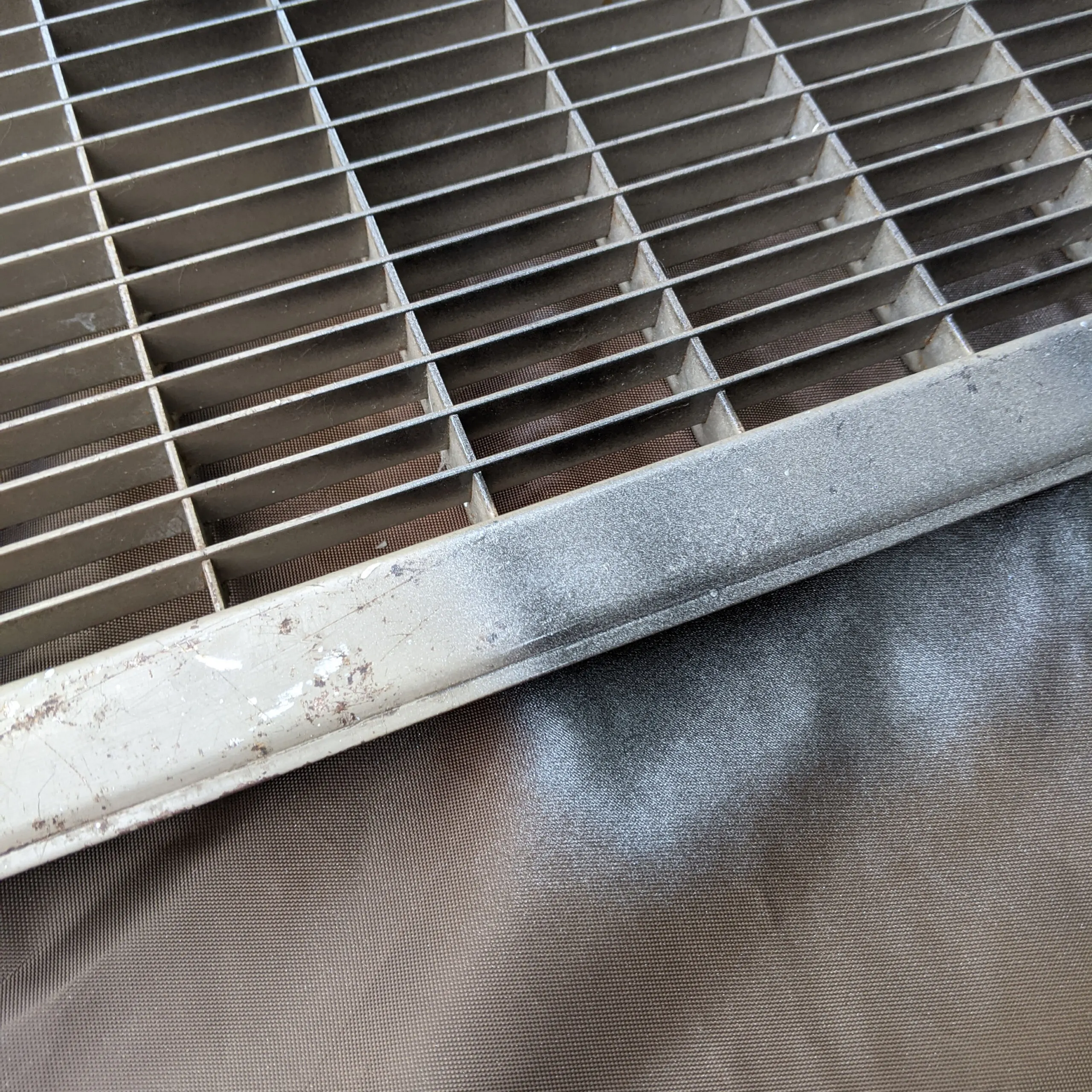 painting heat vent grills with light coats of metallic paint.