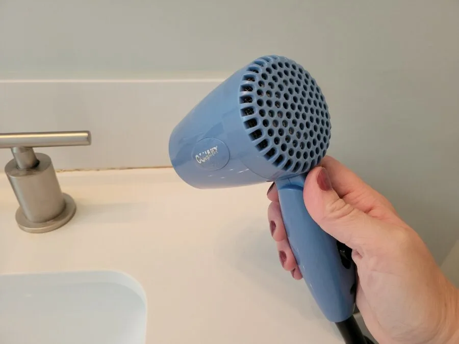 Warm up with a hair dryer to remove nasty old caulk