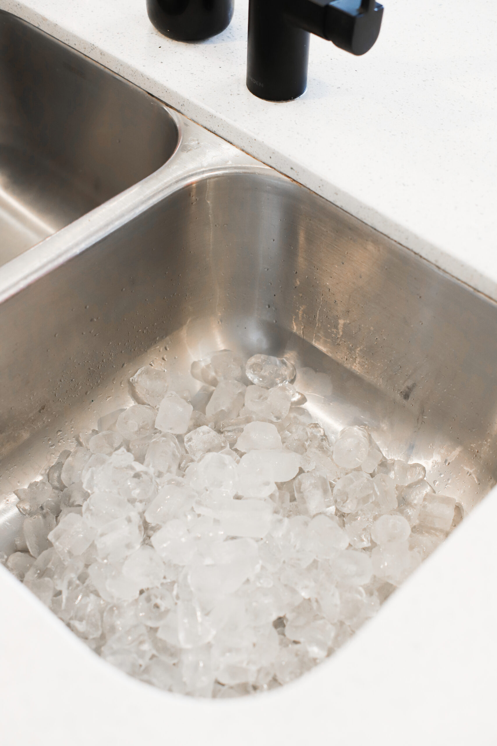 pour ice into your garbage disposal to clean out the grime