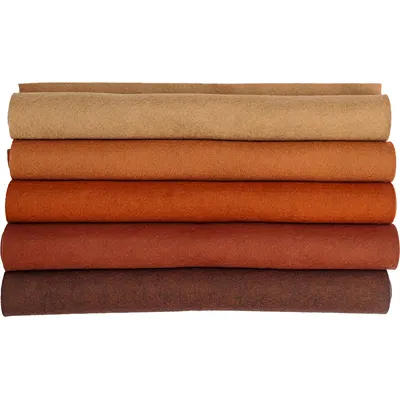a stack of brown felt in different shades