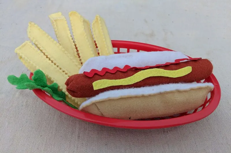  felt crinkle cut French fries pair well with a felt hotdog for pretend play