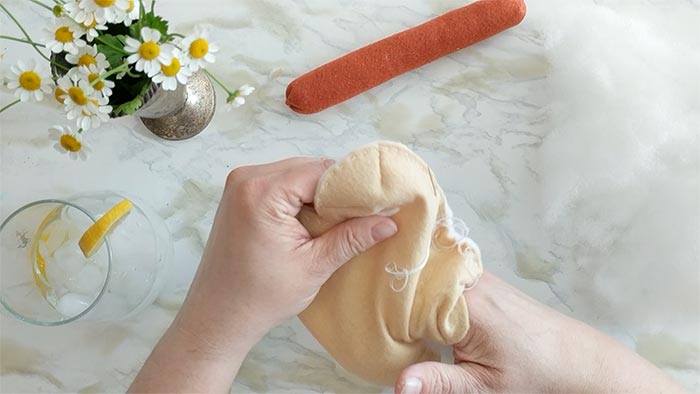 the center channel helps create a place for the hotdog to sit in the felt bun