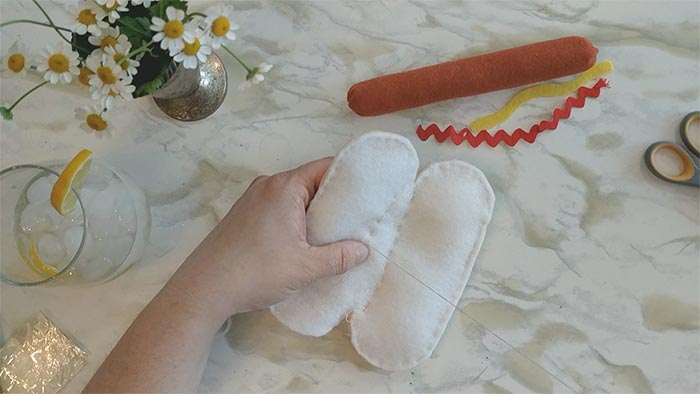 I use stitching down the middle to hold the stuffing in place