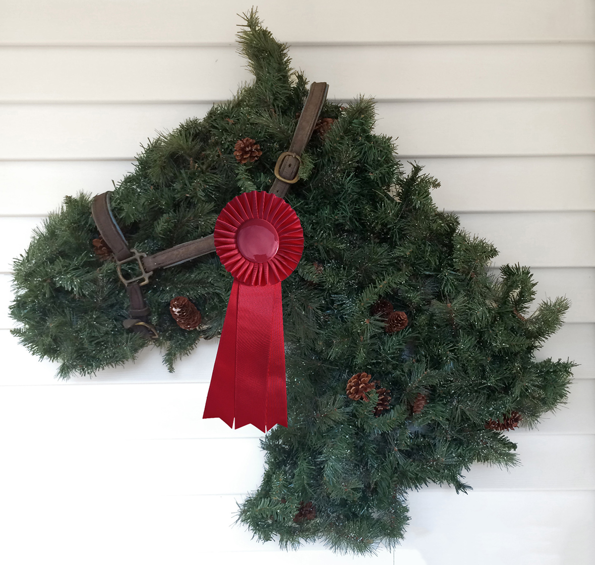 Red horse show ribbons on a horse wreath are fun and festive
